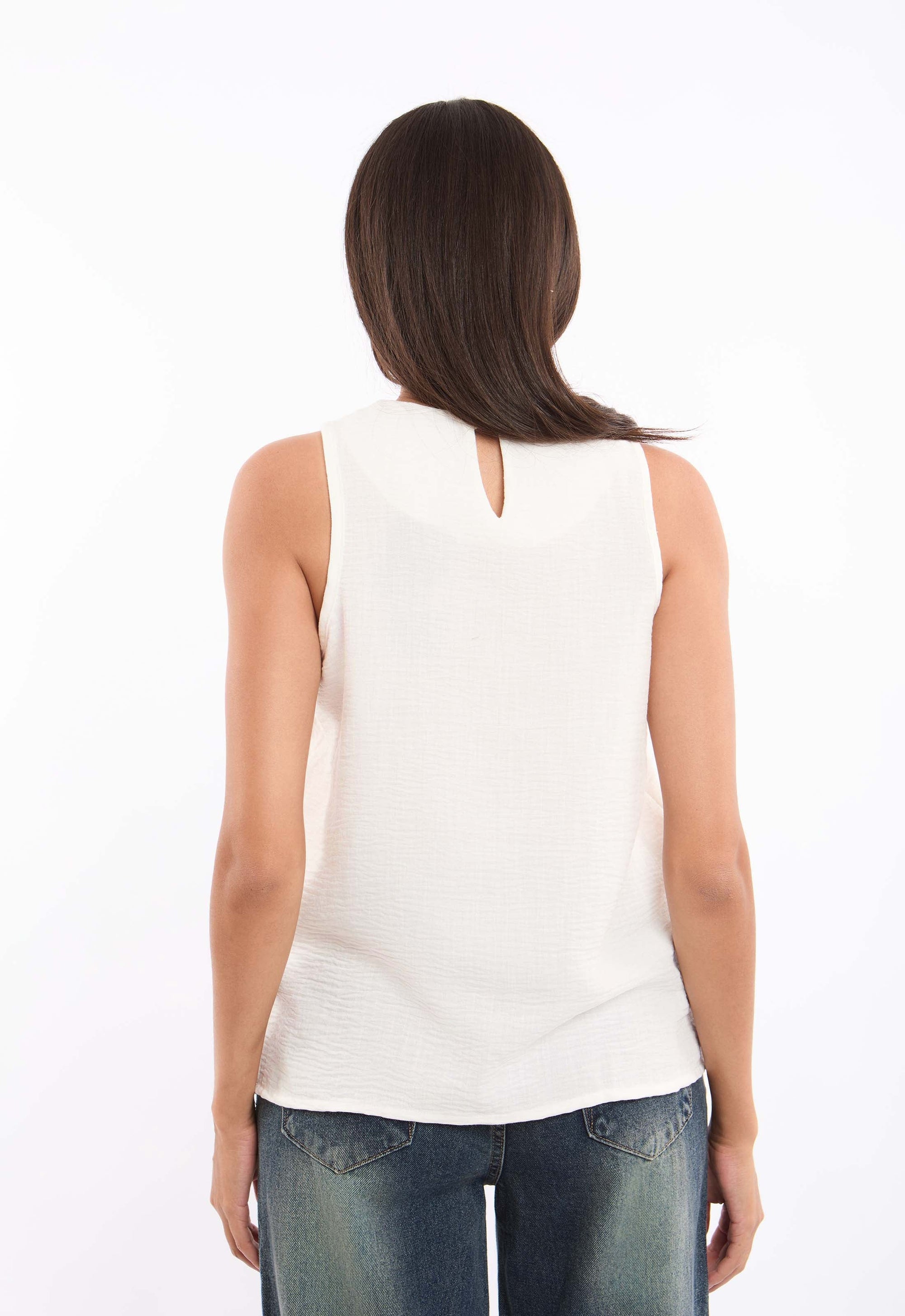 توب بدون أكمام بملمس بارز وقصة عادية